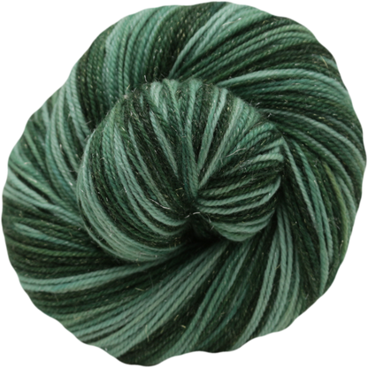 A single skein of self striping yarn in shades of forest green and teal, photographed on a clean white background.