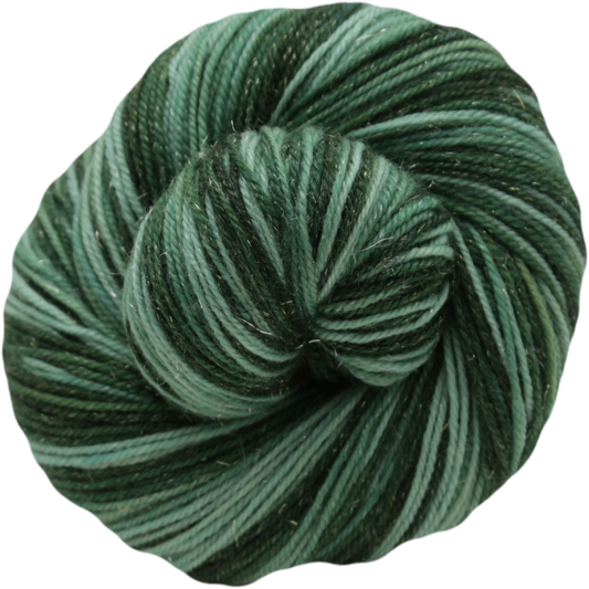 A single skein of self striping yarn in shades of forest green and teal, photographed on a clean white background.