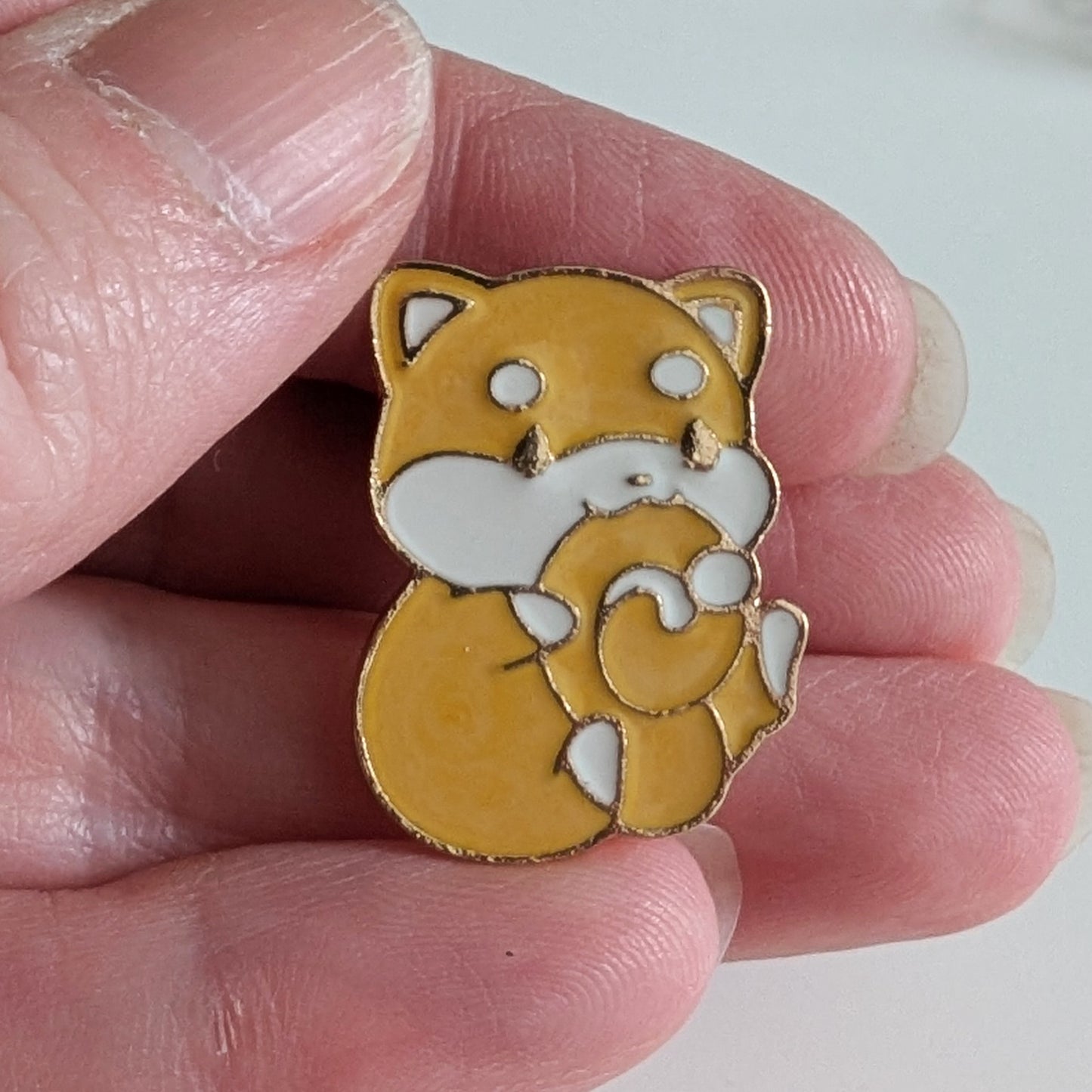 Tail Nom Enamel Pin