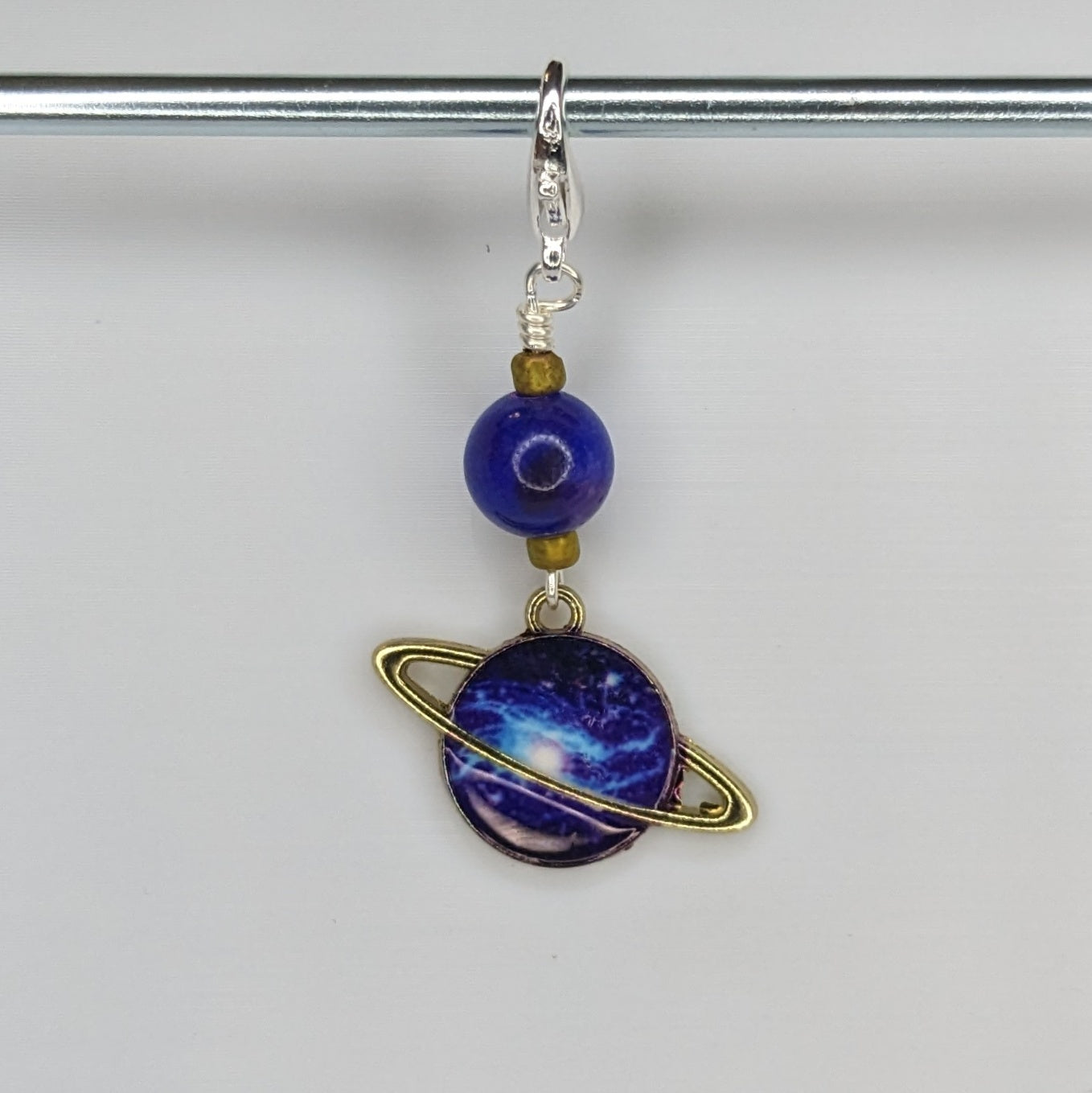 Galactic Saturn Progress Keeper – String Theory Colorworks